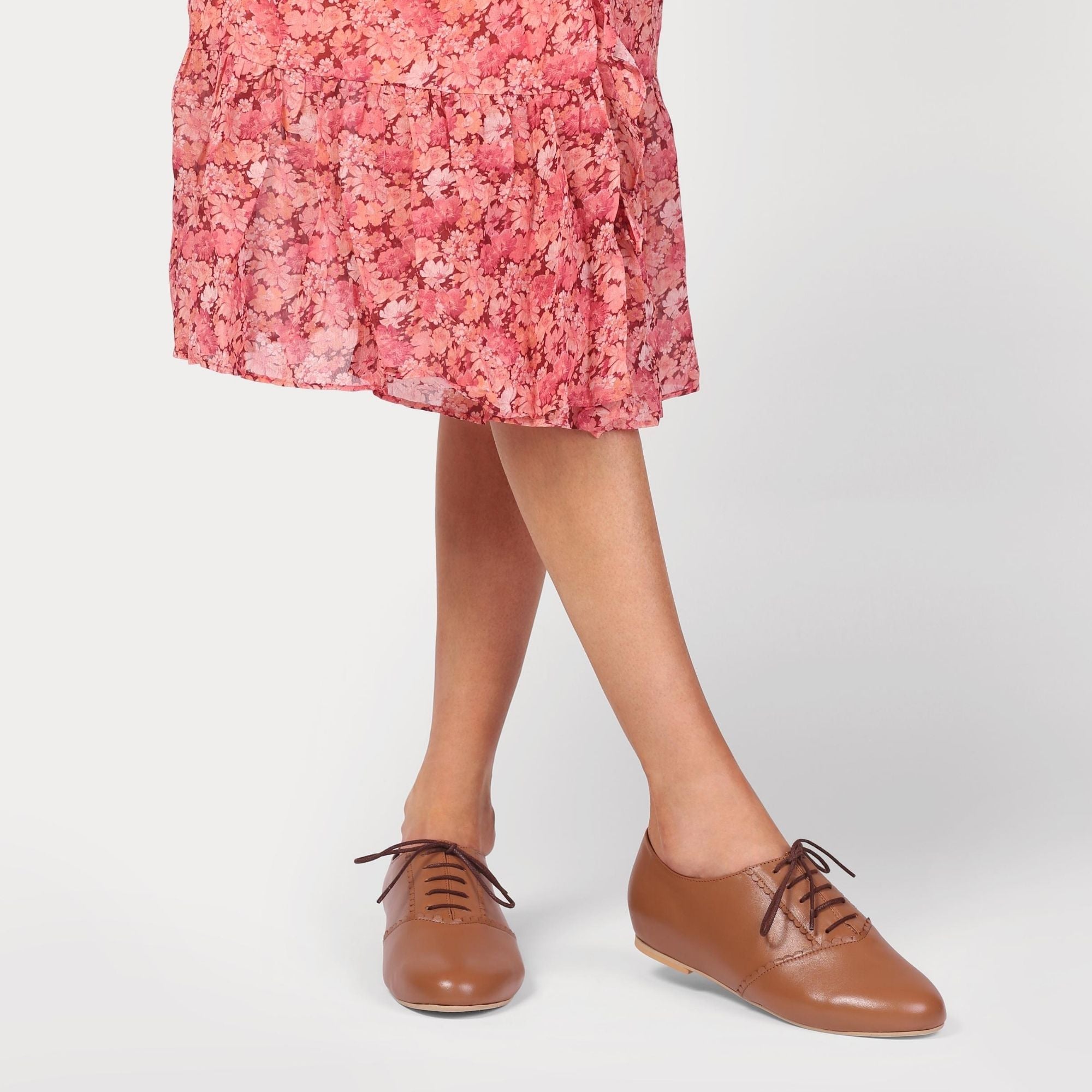 aster tan worn by a model