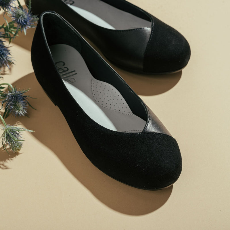 close up black flats for bunions