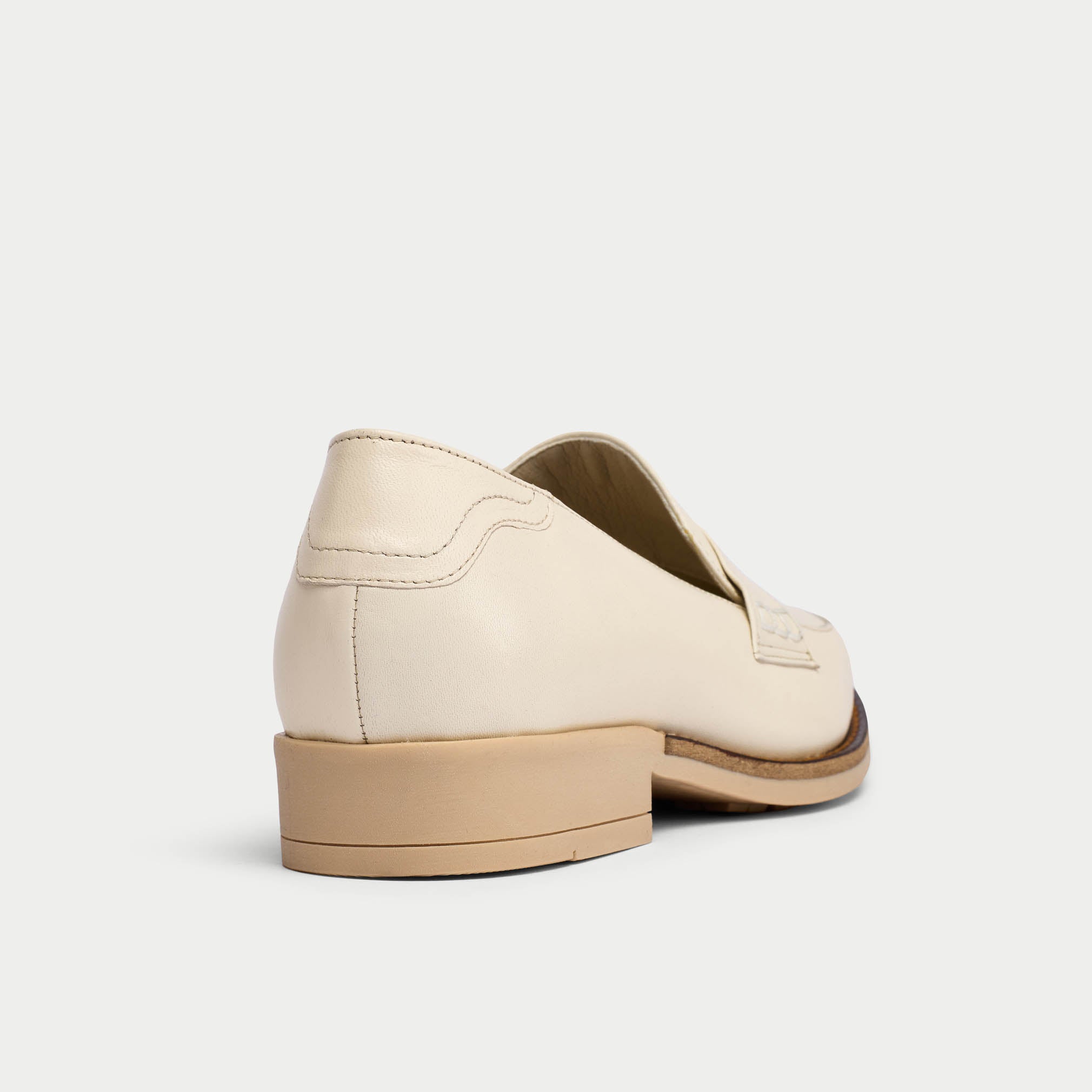 Nadia latte leather loafer heel view
